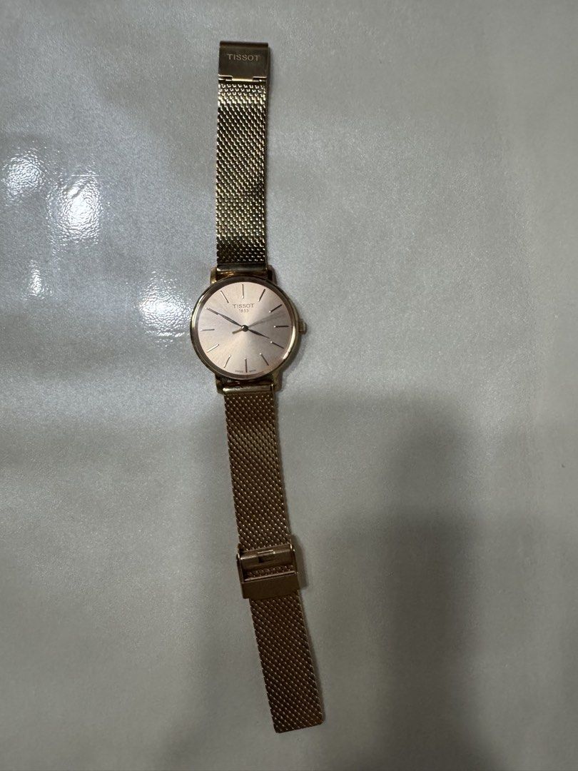 Tissot Watch (Category: Women's Watches) located in Cagayan de Oro. Submitted by serenexsienna (Listing ID 1466457476, Image 3). Description: ✅Tissot 1853 Rose Gold Watch ✅No issue. Comes with original box and warranty ✅bought for PhP 20k ✅Brand: Tissot 1853 (Model: T143210 A) ✅Color/Finish: Elegant rose gold tone ✅Dial: Clean minimalist design with simple hour markers and Swiss Made detailing ✅Strap: Adjustable mesh metal strap with secure clasp