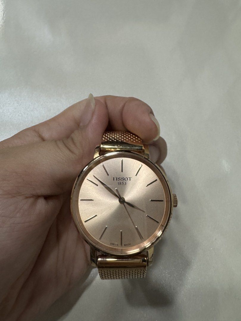 Tissot Watch (Category: Women's Watches) located in Cagayan de Oro. Submitted by serenexsienna (Listing ID 1466457476, Image 1). Description: ✅Tissot 1853 Rose Gold Watch ✅No issue. Comes with original box and warranty ✅bought for PhP 20k ✅Brand: Tissot 1853 (Model: T143210 A) ✅Color/Finish: Elegant rose gold tone ✅Dial: Clean minimalist design with simple hour markers and Swiss Made detailing ✅Strap: Adjustable mesh metal strap with secure clasp