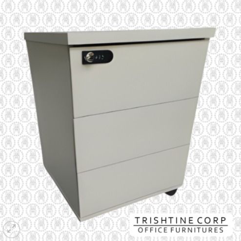 TMP-015 | Wooden Pedestal Combination Lock System (Category: Office Furniture & Fixtures) located in Caloocan City. Submitted by jim.trishtineofficefurnitures (Listing ID 1466417856, Image 1). Description: - Brand: Trishtine Corp Office Furniture - Finish: Durable light grey metal - Storage: 3 spacious drawers with secure lock on top drawer - Mobility: Smooth-rolling wheels for easy movement - Design: Compact size, fits perfectly under any office