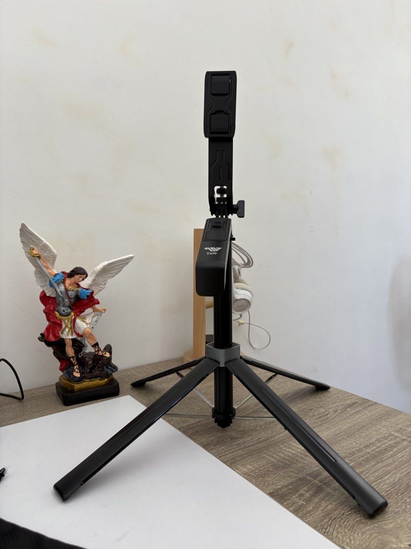 TNW S30 Selfie Stick Tripod (Category: Tripods & Monopods) located in Calamba. Submitted by ealc66554 (Listing ID 1466481348, Image 3). Description: - Model: TNW S30 Selfie Stick Tripod (Black) - Condition: Clean, 100% working condition - Features: Extends to a great height, doubles as a sturdy standing tripod - Perfect for: Vlogging, video calls, and photos - Inclusions: Original box, charging cable, and instruction manual.