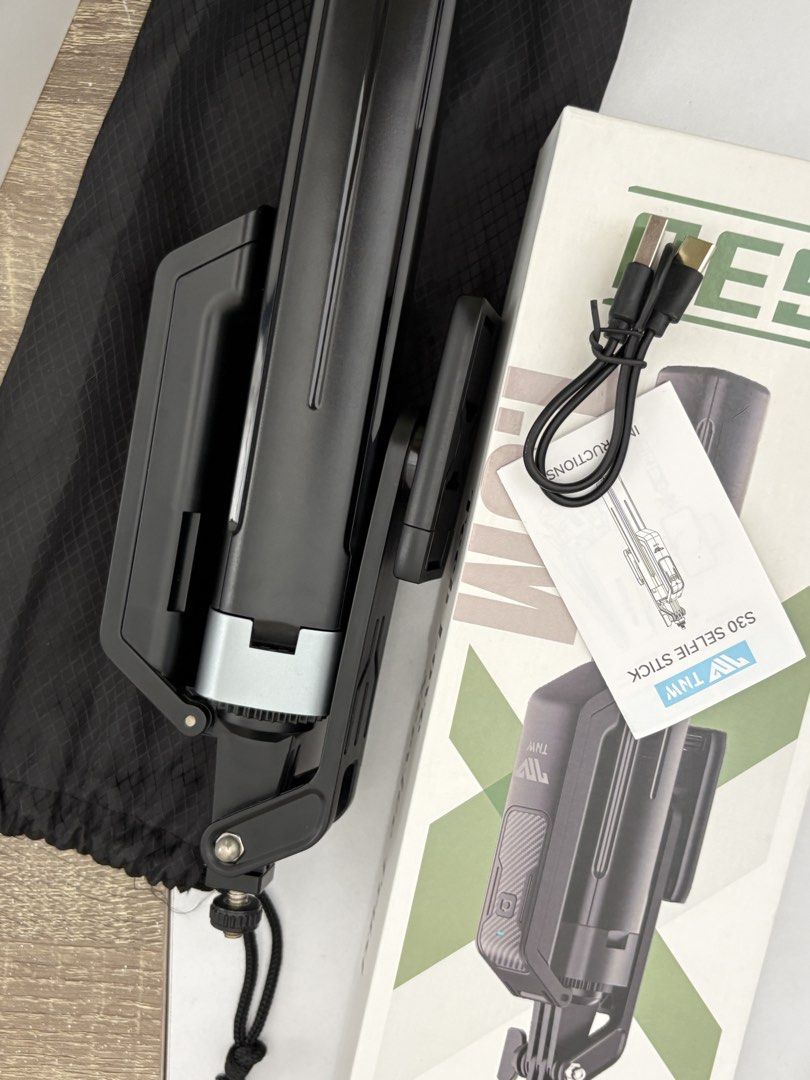 TNW S30 Selfie Stick Tripod (Category: Tripods & Monopods) located in Calamba. Submitted by ealc66554 (Listing ID 1466481348, Image 1). Description: - Model: TNW S30 Selfie Stick Tripod (Black) - Condition: Clean, 100% working condition - Features: Extends to a great height, doubles as a sturdy standing tripod - Perfect for: Vlogging, video calls, and photos - Inclusions: Original box, charging cable, and instruction manual.