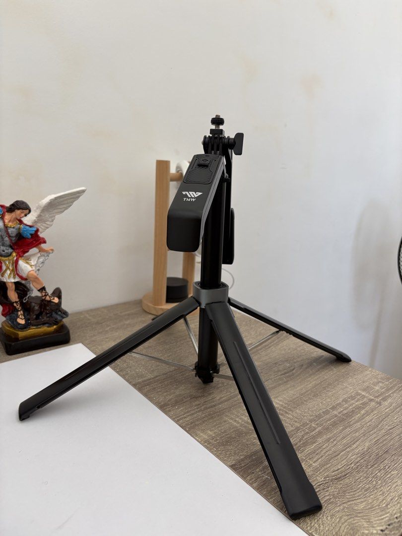 TNW S30 Selfie Stick Tripod (Category: Tripods & Monopods) located in Calamba. Submitted by ealc66554 (Listing ID 1466481348, Image 2). Description: - Model: TNW S30 Selfie Stick Tripod (Black) - Condition: Clean, 100% working condition - Features: Extends to a great height, doubles as a sturdy standing tripod - Perfect for: Vlogging, video calls, and photos - Inclusions: Original box, charging cable, and instruction manual.