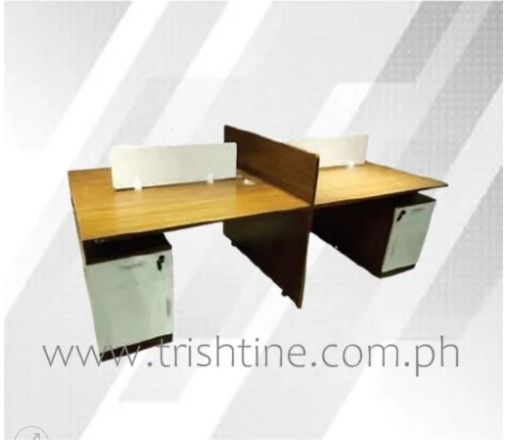 TOFF-042 | 4 seater Built-in Office Workstation (Category: Office Furniture & Fixtures) located in Caloocan City. Submitted by jim.trishtineofficefurnitures (Listing ID 1466427630, Image 1). Description: - Type: Two-person workstation desk setup - Surface: Wood grain finish with a center privacy divider - Storage: Built-in white cabinets with locks under each station - Features: Cable management grommets for a clean workspace - Design: Clean, pro