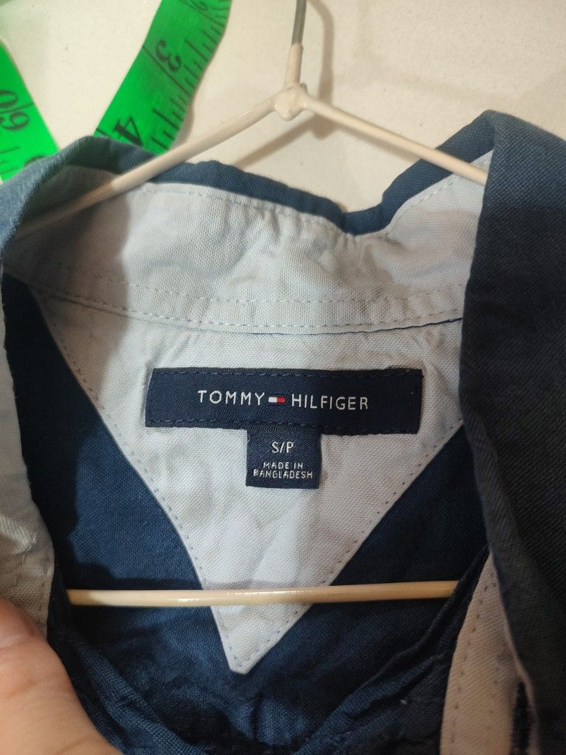 Tommy Hilfiger Blue Button Up Shirt S/P (Category: Tshirts & Polo Shirts ) located in Manila. Submitted by momofunodos (Listing ID 1460199031, Image 2). Description: ALL ITEMS ARE PRE-LOVED ✅Bale source. ✅Ukay thrifted. ✅Manage your expectations these are ukay.( dont expect crispy as new) ✅ Colors may different in person due to camera lens and lights. ✅ There's a sign of usage in every item ✅ Small stain washable stain are normal in ukay we do no