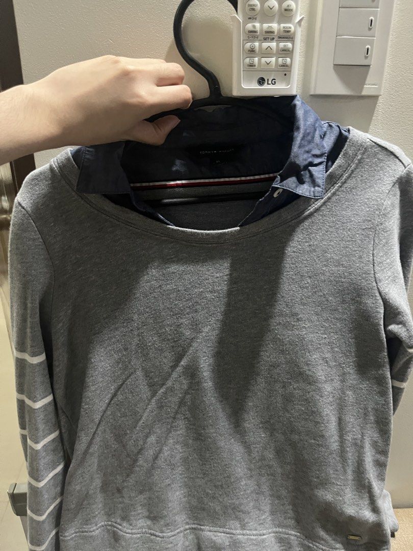 Tommy Hilfiger Grey Layered Sweater (Category: Coats, Jackets and Outerwear) located in Balanga. Submitted by sagekinsclothingstore (Listing ID 1466500386, Image 2). Description: Cute little sweatshirt! 💫 I never wore this, only stored because of the weather sa PH 😅 - Brand: Tommy Hilfiger - Size: XS (fits true to size) - Condition: Excellent pre-loved condition.