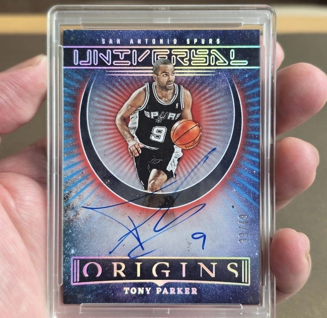 Tony Parker (Category: Raw Singles) located in Mandaluyong City. Submitted by kyreii (Listing ID 1466537529, Image 1). Description: - Player: Tony Parker (San Antonio Spurs) - Set: Panini Origins Universal Insert /49 - Autograph: On-card blue ink signature with jersey number 9 - Rarity: Limited edition, numbered 33/49 on the front - Protection: Comes in a secure clear magnetic one-touch card holder - Condition: Excellent collectible condition.