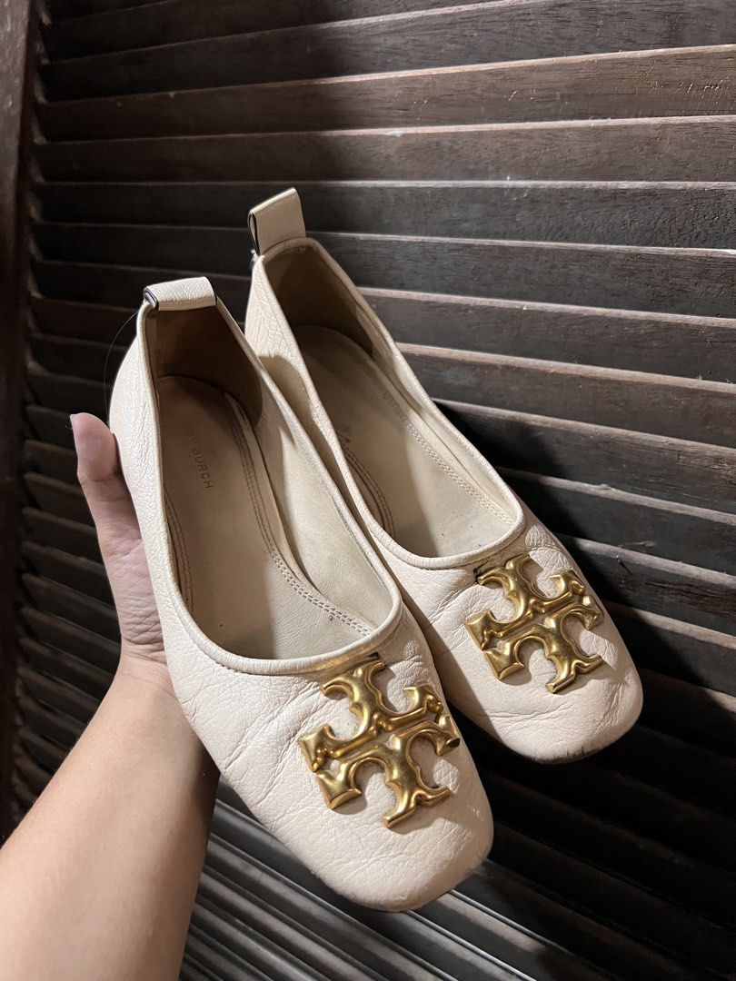 Tory Burch Cream Leather Block Heel Pumps (Category: Loafers) located in Quezon City. Submitted by rizza14ortiz (Listing ID 1466372241, Image 2). Description: Cream leather pumps by Tory Burch. Chunky block heels, gold tone metal logo hardware on the toes. Vibram protective soles added to the bottoms. Size 37 Some scuffing on the front toe areas from wear. Solid everyday heels..