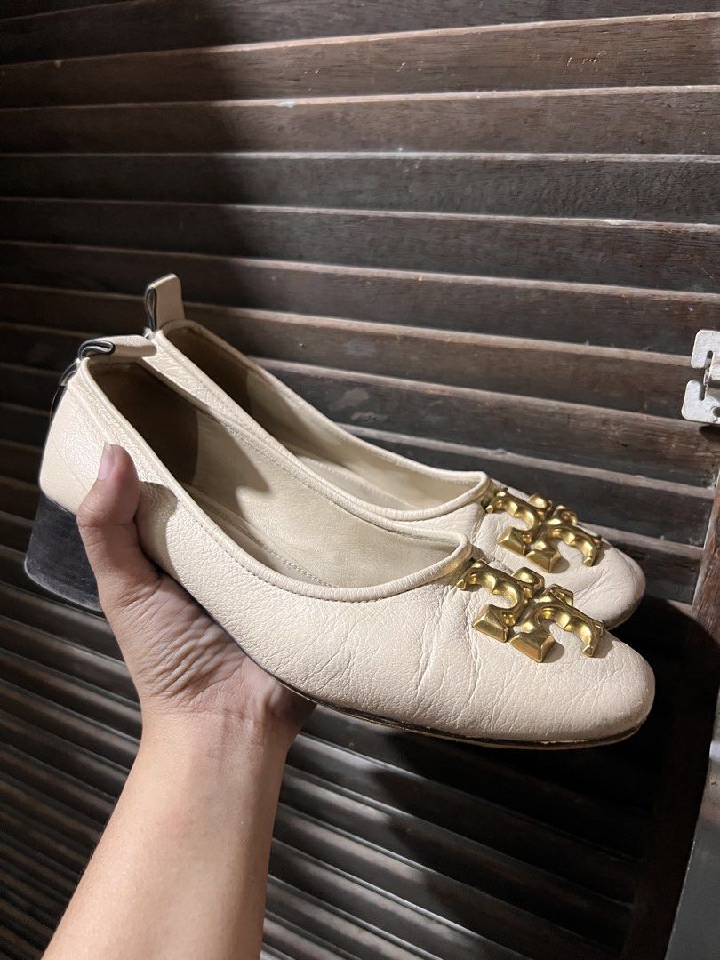 Tory Burch Cream Leather Block Heel Pumps (Category: Loafers) located in Quezon City. Submitted by rizza14ortiz (Listing ID 1466372241, Image 1). Description: Cream leather pumps by Tory Burch. Chunky block heels, gold tone metal logo hardware on the toes. Vibram protective soles added to the bottoms. Size 37 Some scuffing on the front toe areas from wear. Solid everyday heels..