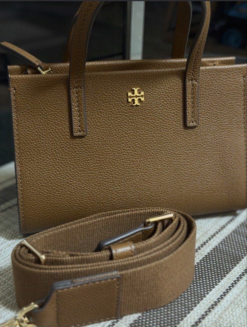 Tory Burch Mini Blake (Category: Luxury Bags & Wallets) located in Pasig City. Submitted by stuffrightnow (Listing ID 1466468582, Image 1). Description: - Brand: Tory Burch - Authentic from USA - Material: Premium brown pebbled leather - Color: Brown with gold-tone hardware - Design: Mini carryall tote with signature gold T-logo medallion - Closure: Secure zip top - Strap: Includes matching adjustable webbed shoulder strap with leather trim - Con