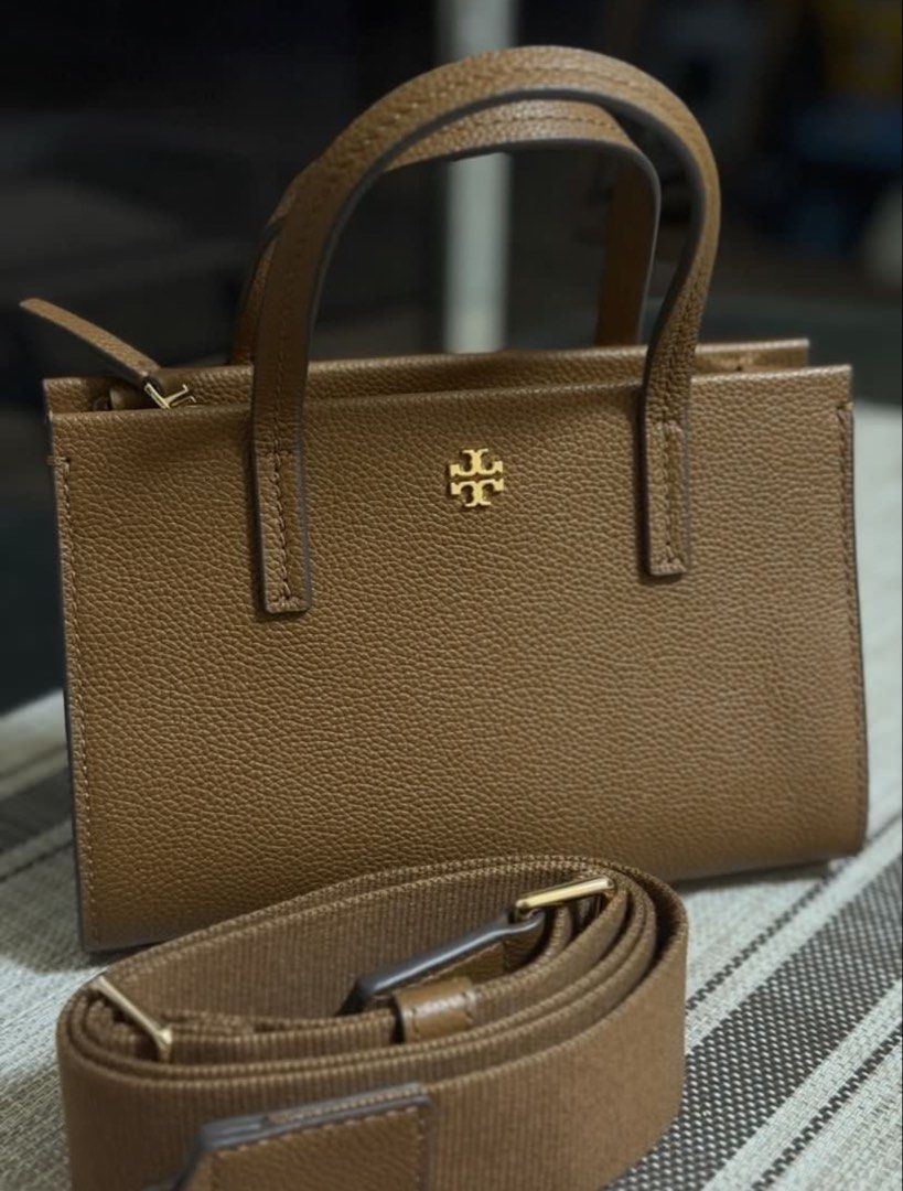 Tory Burch Mini Blake (Category: Luxury Bags & Wallets) located in Pasig City. Submitted by stuffrightnow (Listing ID 1466468582, Image 2). Description: - Brand: Tory Burch - Authentic from USA - Material: Premium brown pebbled leather - Color: Brown with gold-tone hardware - Design: Mini carryall tote with signature gold T-logo medallion - Closure: Secure zip top - Strap: Includes matching adjustable webbed shoulder strap with leather trim - Con