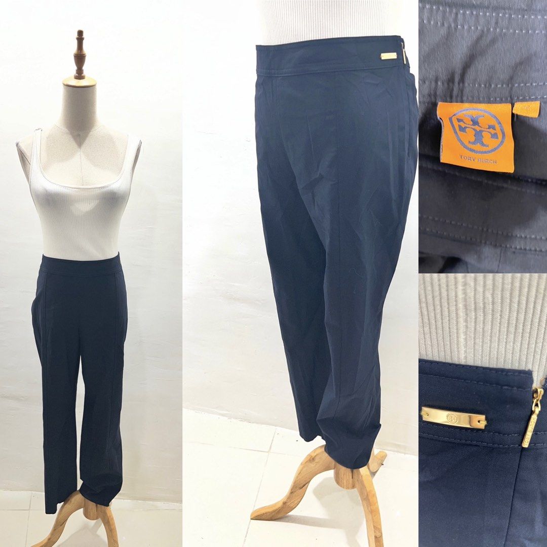Tory Burch Navy Blue Trousers Pants (Category: Jeans) located in Bacolod City. Submitted by bhabissagal-05763 (Listing ID 1466497000, Image 1). Description: - Brand: Tory Burch - Color: Dark blue with orange interior label - Style: Clean straight-leg cut with subtle front seam details - Closure: Gold side zip with engraved logo hardware - Fit: Structured waistband - Condition: EUC, clean everyday wear piece.