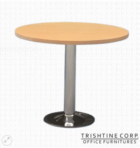 TPT-008 | Round Pantry Table (Category: Tables & Sets) located in Caloocan City. Submitted by jim.trishtineofficefurnitures (Listing ID 1466412160, Image 1). Description: - Type: Round wooden table with single pedestal design - Materials: Light wood finish top with chrome-toned metal column and circular base - Stability: Sturdy single pedestal construction for reliable support - Best For: Office breakrooms, small meeting rooms, or casual dining a