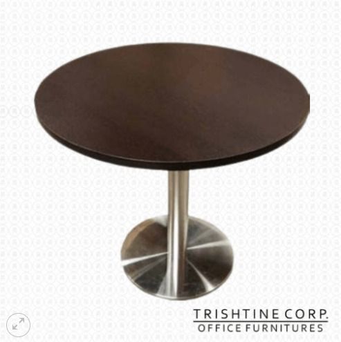 TPT-009 | Mini-Conference Round Table (Category: Tables & Sets) located in Caloocan City. Submitted by jim.trishtineofficefurnitures (Listing ID 1466411786, Image 1). Description: - Round wooden top with a stylish dark brown finish - Heavy-duty silver steel pedestal base for maximum stability - Space-saving single-leg design maximizes legroom and fits small spaces - Ideal for apartments, breakfast nooks, or office breakrooms - Low maintenance: sm