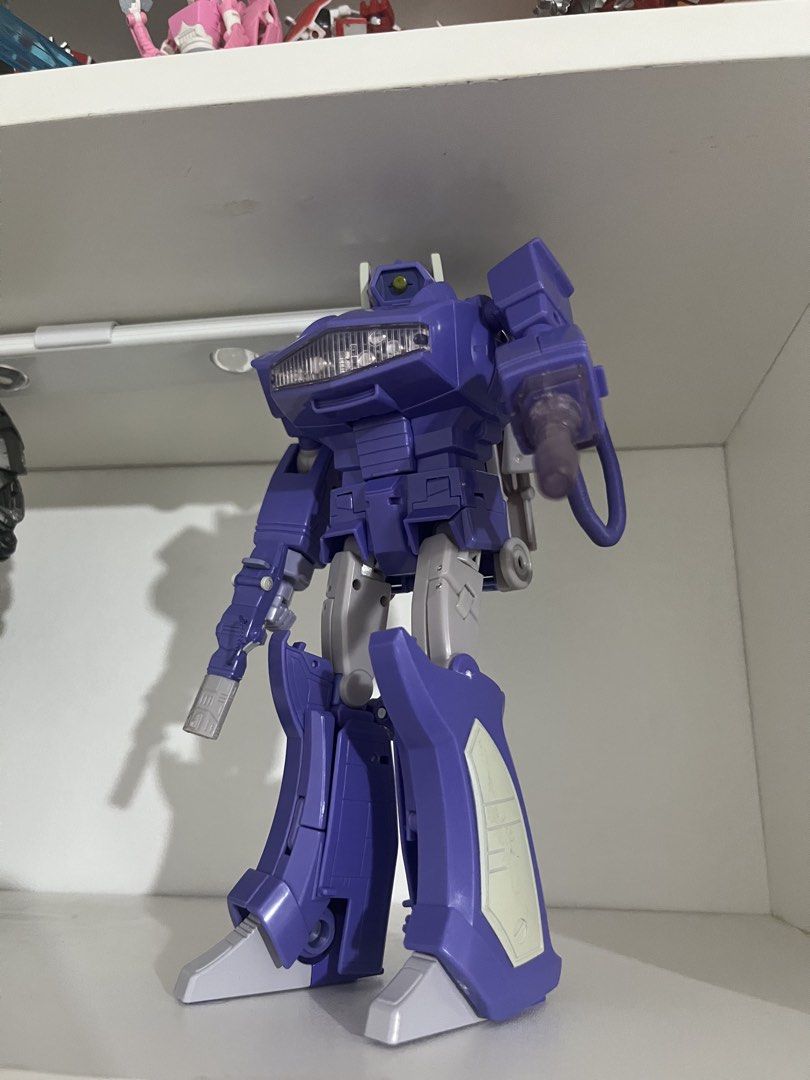 Transformers Shockwave purple robot action figure toy (Category: Action & Battle Toys) located in Quezon City. Submitted by renzo__01 (Listing ID 1466493535, Image 1). Description: - Purple and grey robot action figure - Classic single-eye head design with ribbed chest piece - Built-in blaster arm feature - Solid build with good joint mobility - Clean display piece, taken straight from the shelf.