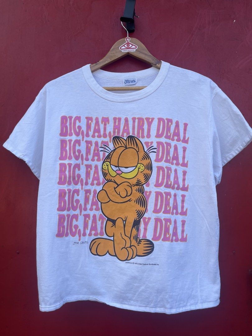 True vintage Garfield shirt (Category: Tshirts & Polo Shirts ) located in Cavite. Submitted by thriftniowen (Listing ID 1466467854, Image 1). Description: True vintage Garfield 70s 80s shirt Size medium to large Chest: 21 Length: 24 Condition: good Flaws: stain and pinhole.