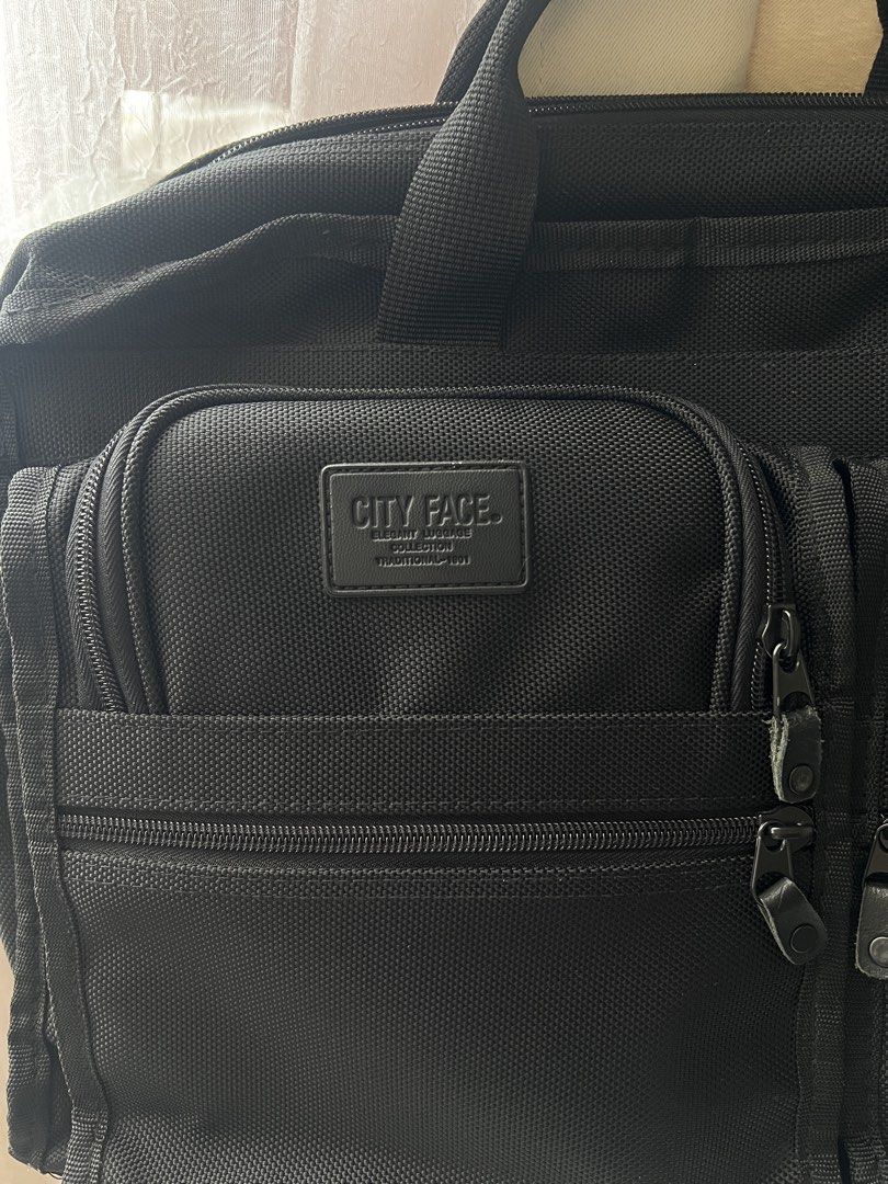 Tumi Alpha Business Laptop Bag (Category: Laptop Bags & Sleeves) located in Quezon City. Submitted by hgaby (Listing ID 1466352545, Image 2). Description: In good condition, all working zippers, no sling.