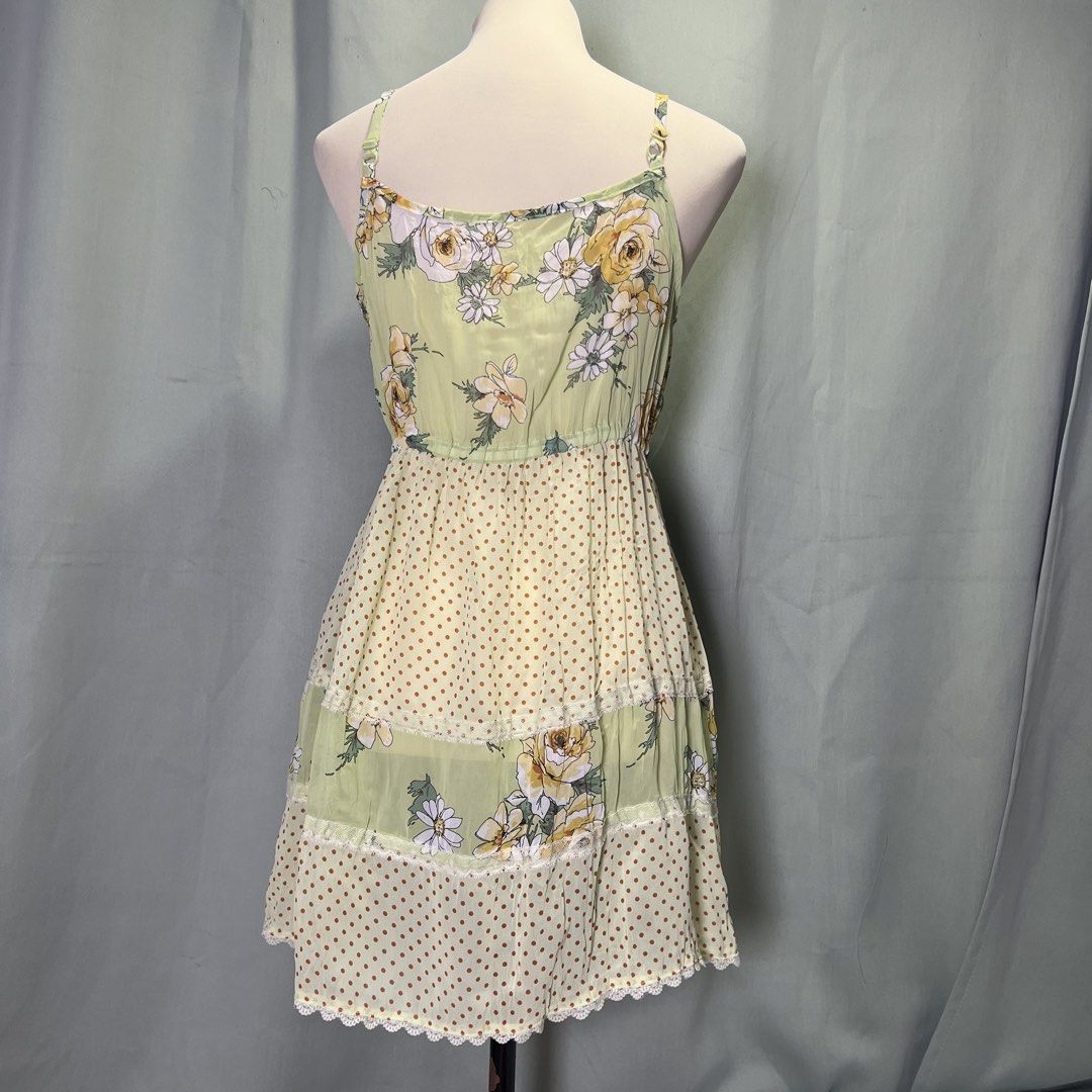 twee lime green sun dress (Category: Dresses) located in Malabon City. Submitted by minidressmonster (Listing ID 1466472660, Image 3). Description: cute twee floral and polka lime green cami babydoll dress with ruffles and lace trim adjustable straps best fit xs medyo see thru sha, i recommend wearing something underneath worn once on vacay :) good as new!.