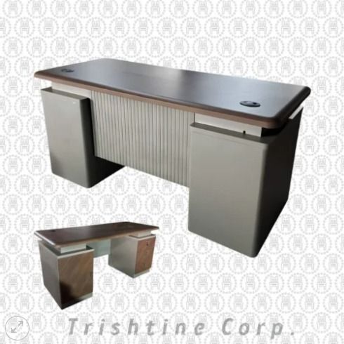 TXT-060 | Modern Executive Desk (Category: Office Furniture & Fixtures) located in Caloocan City. Submitted by jim.trishtineofficefurnitures (Listing ID 1466400649, Image 1). Description: - Dark wood top with a professional and sleek finish - Silver-toned pedestals and ribbed modesty panel for a modern look - Built-in cable management grommets to keep wires neat and organized - Two spacious side cabinets for ample storage and workspace organizati