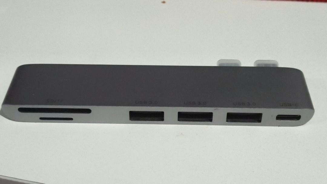 UGREEN USB-C Multifunction Adapter 60560 (Category: Cables & Adaptors) located in Manila. Submitted by cmjunks (Listing ID 1466486877, Image 1). Description: - Brand: UGREEN (Model 60560) - Material: Sleek aluminum shell 🔌 Ports • 3× USB 3.0 Type-A • 1× USB-C port • 1× SD card slot • 1× TF / MicroSD card slot • 2× USB-C male connectors ⚡ Specifications • USB 3.0 transfer speed up to 5Gbps • USB-C port supports PD charging, data transmission and 