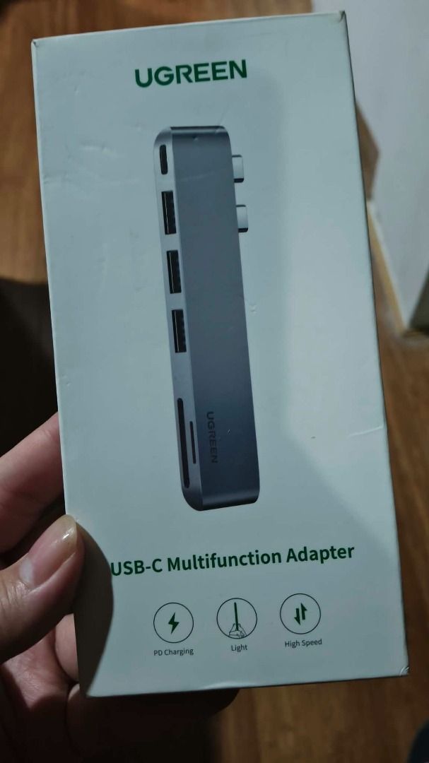 UGREEN USB-C Multifunction Adapter 60560 (Category: Cables & Adaptors) located in Manila. Submitted by cmjunks (Listing ID 1466486877, Image 2). Description: - Brand: UGREEN (Model 60560) - Material: Sleek aluminum shell 🔌 Ports • 3× USB 3.0 Type-A • 1× USB-C port • 1× SD card slot • 1× TF / MicroSD card slot • 2× USB-C male connectors ⚡ Specifications • USB 3.0 transfer speed up to 5Gbps • USB-C port supports PD charging, data transmission and 