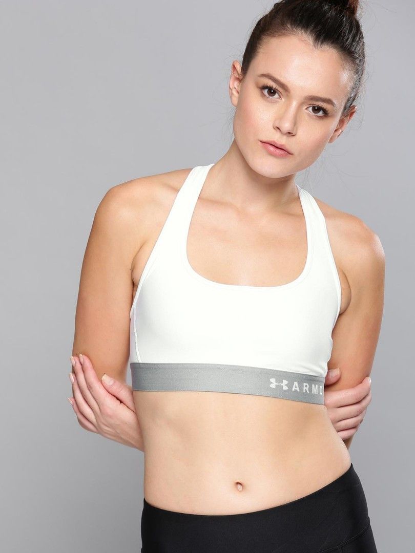 Under Armor Mid crossback sports bra (Category: Activewear) located in Santa Maria. Submitted by paulo-garcia21 (Listing ID 1466475677, Image 1). Description: large on tag no flaws excellent condition.