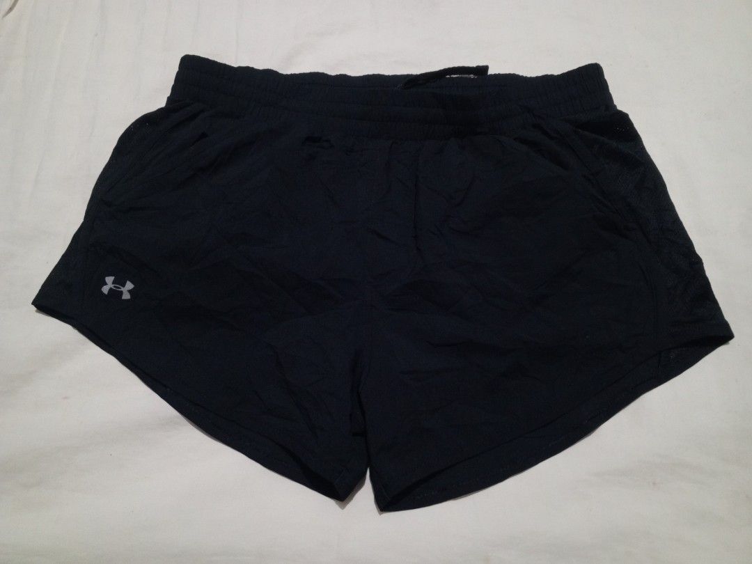 Under armour running shorts (Category: Activewear) located in Santa Maria. Submitted by paulo-garcia21 (Listing ID 1466460333, Image 1). Description: medium on tag waist 30 to 38 length 11 hem 11.5 no flaws with 2 pockets excellent condition.