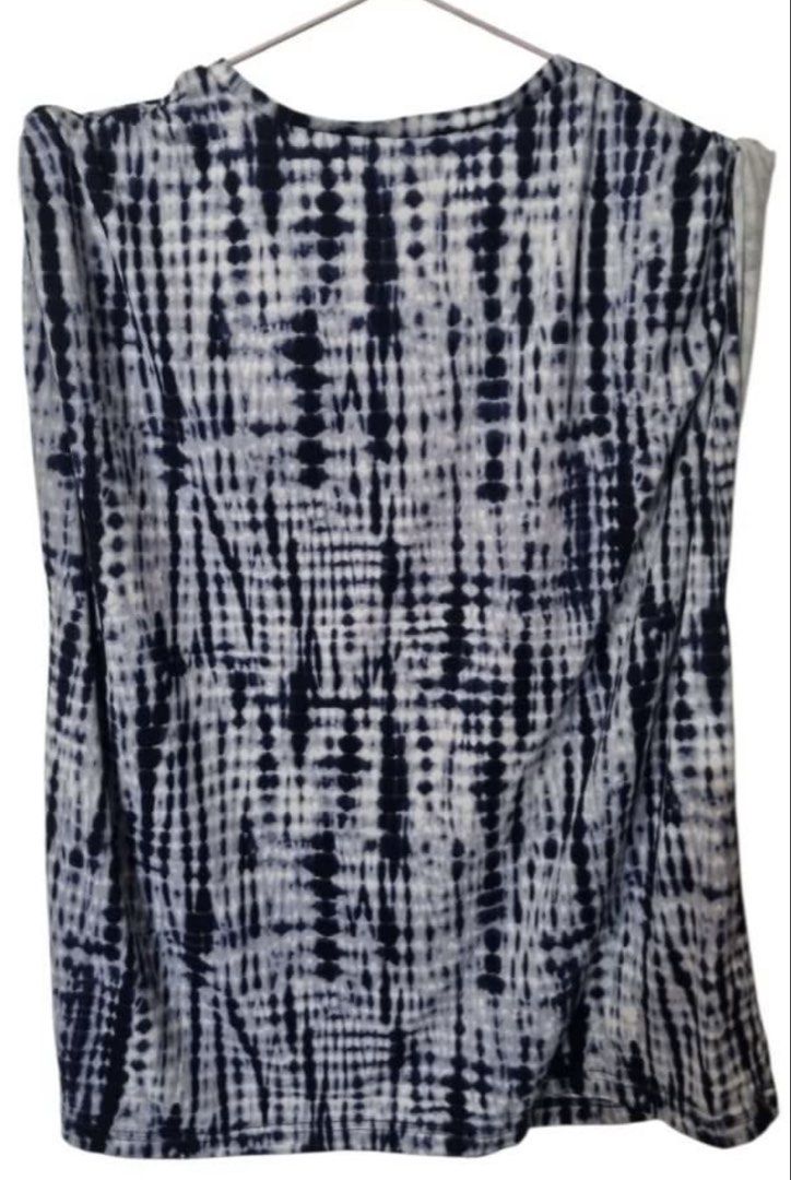 UNIFORM Blue White Tie Dye Sleeveless Top (Category: Sleeveless) located in Quezon City. Submitted by kcobs (Listing ID 1466483322, Image 3). Description: UNIFORM brand sleeveless top, size XL. Blue and white tie dye print with vertical stripe effect. Round neckline, casual relaxed fit. Easy to pair with dark trousers or denim. Great everyday staple piece. Clean and ready to wear. - comfy and still in good condition - Xl but fits large best - gre