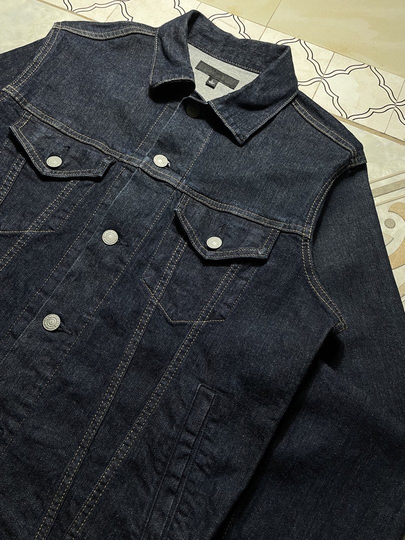 Uniqlo Denim Trucker Jacket (Category: Coats, Jackets and Outerwear) located in Quezon City. Submitted by renovare.196 (Listing ID 1466518614, Image 3). Description: Uniqlo Denim Trucker Jacket As New Condition Color Rate: 9.8/10 No Issue Measurements • Width: 20.5 • Length: 25 Price: 850 obo DM IF INTERESTED📥.