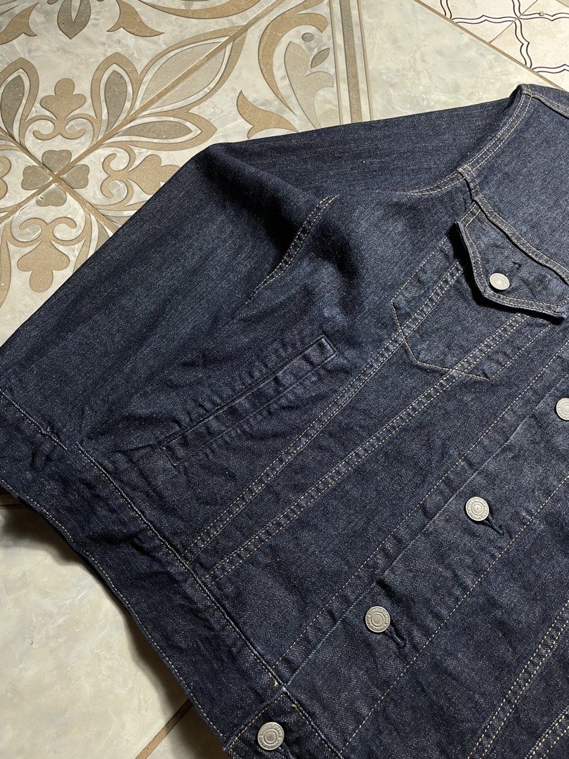 Uniqlo Denim Trucker Jacket (Category: Coats, Jackets and Outerwear) located in Quezon City. Submitted by renovare.196 (Listing ID 1466518614, Image 2). Description: Uniqlo Denim Trucker Jacket As New Condition Color Rate: 9.8/10 No Issue Measurements • Width: 20.5 • Length: 25 Price: 850 obo DM IF INTERESTED📥.