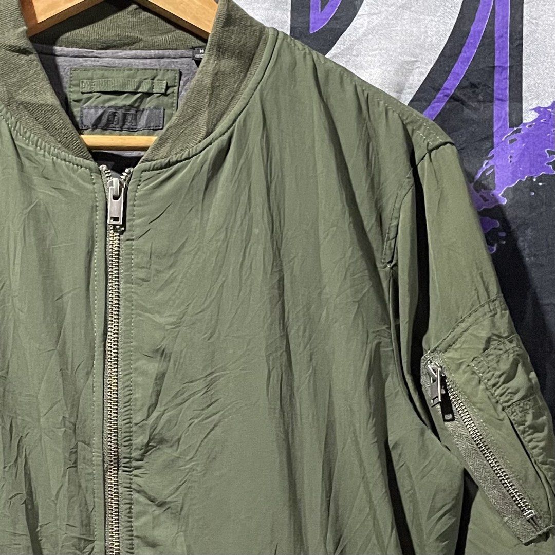 Uniqlo MA-1 Flight Bomber Jacket (Category: Coats, Jackets and Outerwear) located in Pandi. Submitted by 28hundreds (Listing ID 1466547927, Image 2). Description: Uniqlo MA-1 Flight Bomber Jacket W 22 • L 25.5 excellent condition, no flaws, authentic, olive green, water resistant see detailed pics to appreciate the piece thank you. - 1000 +sf bulacan.