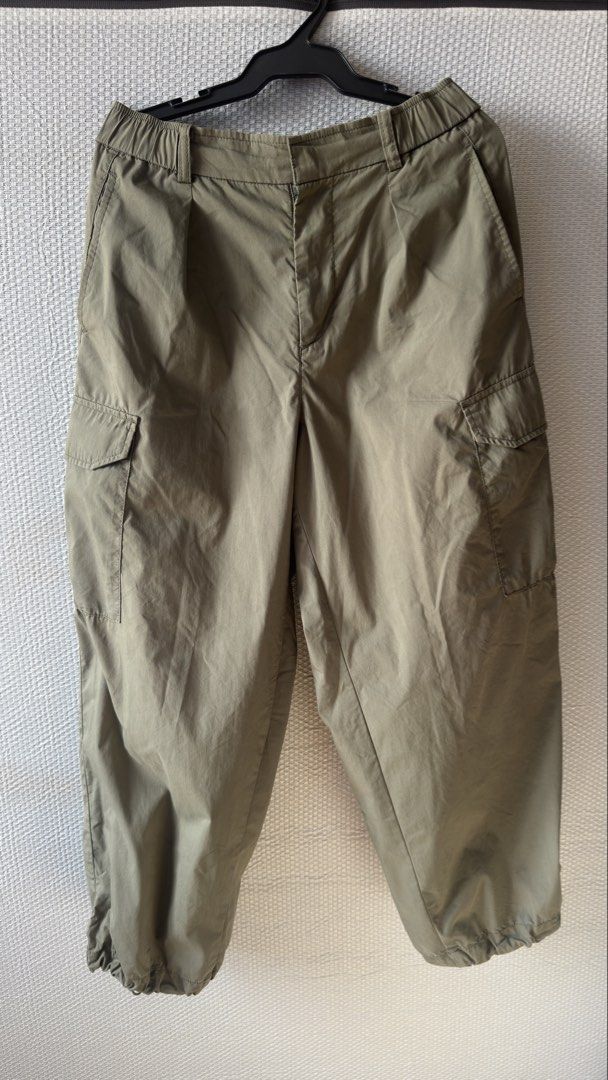 Uniqlo Olive Green Cargo Pants Size S (Category: Jeans) located in Quezon City. Submitted by QuintinZam (Listing ID 1466514204, Image 1). Description: - Brand: Uniqlo - Item: Utility Cargo Pants - Color: Olive Green - Size: S (Fits waist 60-66 cm, Hips 85-91 cm) - Material: 73% Cotton, 27% Nylon - Features: Elastic waistband with belt loops, multiple side cargo pockets, and adjustable cinched ankle cuffs - Fit: Relaxed fit, ideal for casual wear 