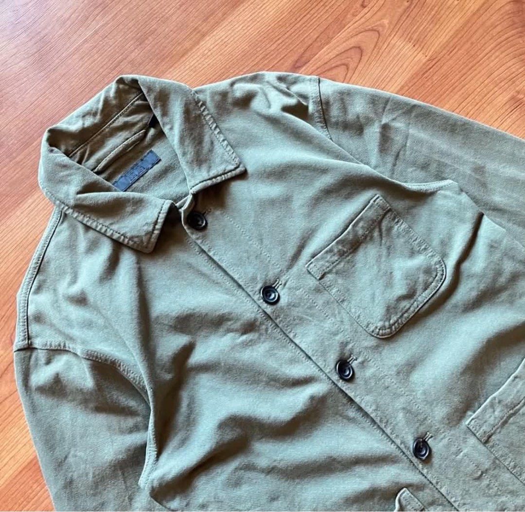 Uniqlo Olive Green Utility Jacket (Category: Coats, Jackets and Outerwear) located in Rizal. Submitted by timelessfinds89_ (Listing ID 1466510117, Image 2). Description: - Brand: Uniqlo - Color: Olive green - Size: Small (fits chest 80-88 cm) - Material: Cotton and spandex (with slight stretch) - Design: Button-up front with classic collar - Pockets: One chest pocket and two lower patch pockets - Condition/Origin: Made in Vietnam, great for every