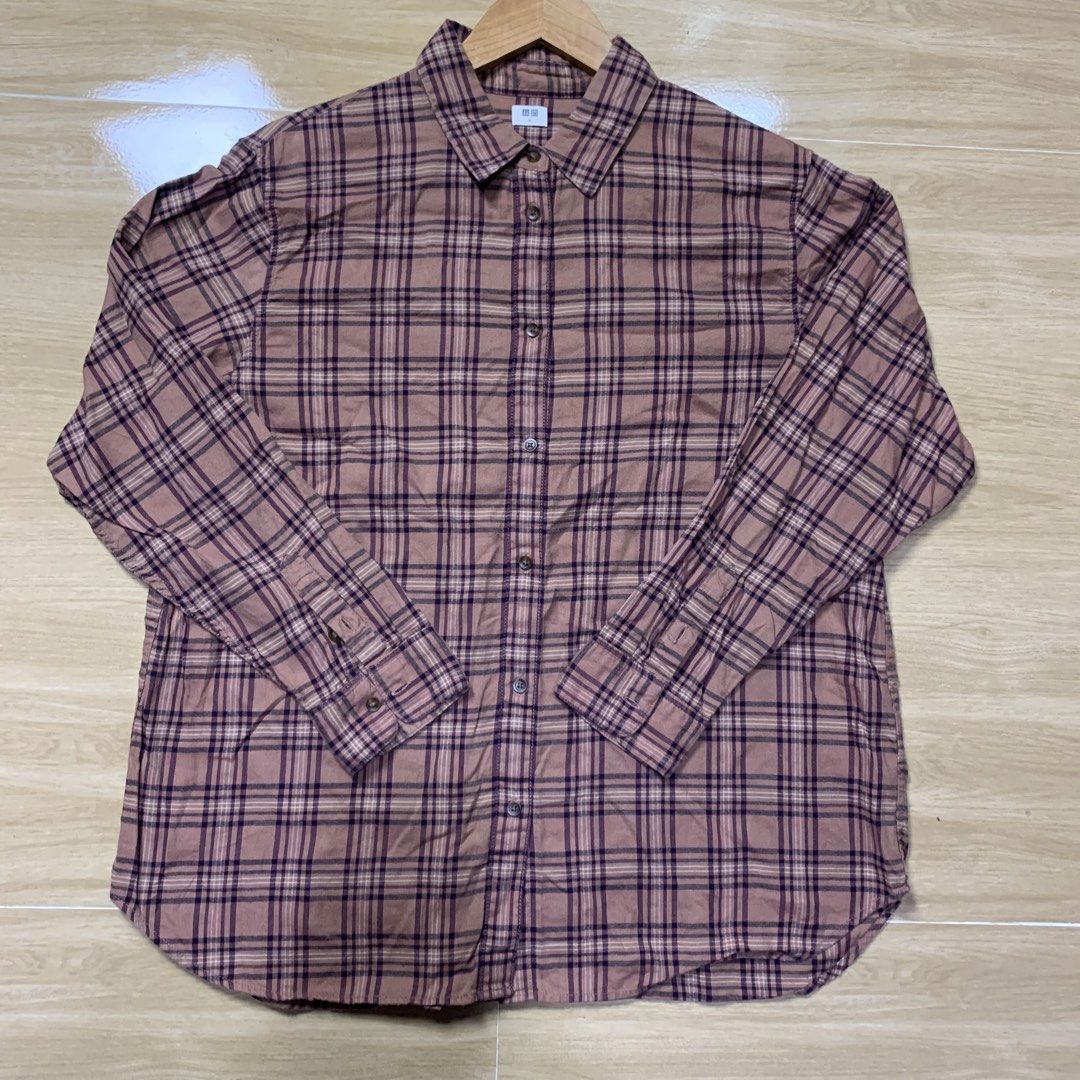 Uniqlo Plaid Long Sleeve Button Down Shirt (Category: Longsleeves) located in Kalibo. Submitted by gneiss2002 (Listing ID 1466357775, Image 1). Description: - Brand: Uniqlo - Style: Long sleeve button-down shirt with classic plaid pattern in mauve and dark purple - Fit: Standard fit with regular collar, button cuffs, and curved hem - Fabric: Lightweight and versatile, great for layering or wearing on its own - Condition: Clean and well-kept.