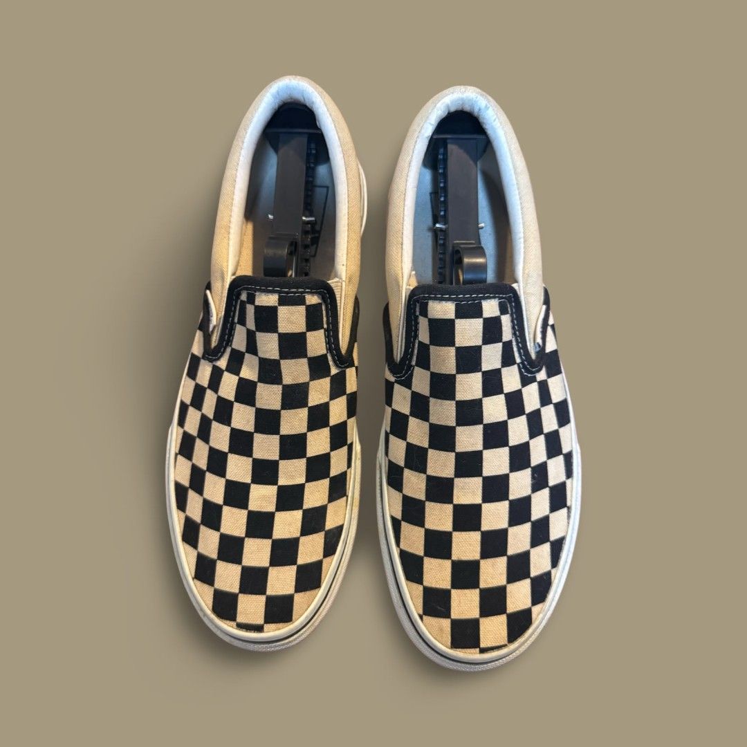 Vans Classic Slip-On Checkerboard Black White (Category: Casual Shoes) located in Del Monte. Submitted by jasonjuan31 (Listing ID 1466498068, Image 1). Description: - Brand: Vans Classic Slip-On sneakers - Design: Iconic black and white checkerboard canvas upper - Features: Easy slip-on style with elastic side accents, white rubber midsoles, and signature waffle outsoles - Sizing: Men's sizing (refer to inner tags) - Condition: Shows slight yello
