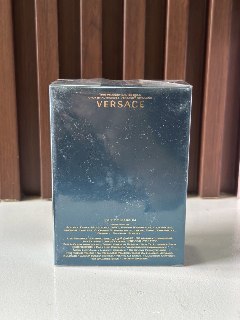 Versace Eros Eau De Parfum 100ml (Category: Fragrance & Deodorants) located in Caloocan City. Submitted by brandeditemsph (Listing ID 1466390179, Image 2). Description: - Brand: Versace Eros - Type: Eau De Parfum (EDP) - Size: 100 ml - Condition: Brand new, still sealed in original plastic wrapper - Packaging: Authentic deep blue box with gold Greek key border and Medusa logo - Application: Spray nozzle - Details: Ingredients and warnings printed