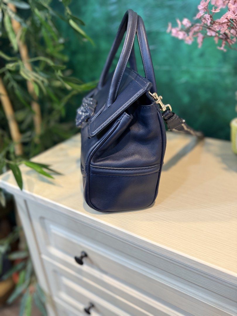 Versace small hand bag (Category: Luxury Bags & Wallets) located in Quezon City. Submitted by fivethousandlilies (Listing ID 1466416317, Image 2). Description: Authentic Missing strap provided dior strap No flaws missing strap only.