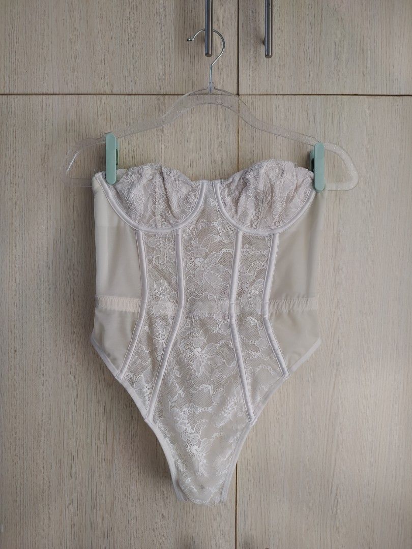 Victoria's Secret White Bodysuit (Category: Bikinis & Swimsuits) located in Bacoor. Submitted by lieze (Listing ID 1466442920, Image 1). Description: used thrice only see thru may wire sa bra part corset type v cut sa back.