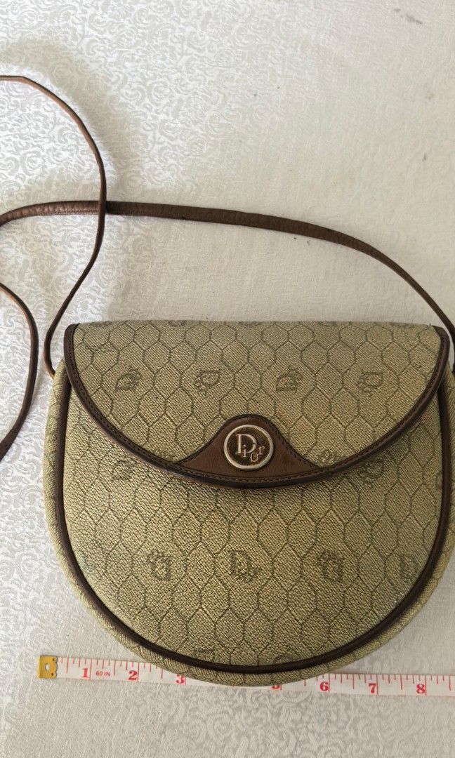 Vintage CD coated monogram canvass (Category: Cross-body Bags) located in Tuguegarao City. Submitted by zenphoenix-7ad615 (Listing ID 1466418526, Image 2). Description: Sale With signs of use sa mga leather part.
