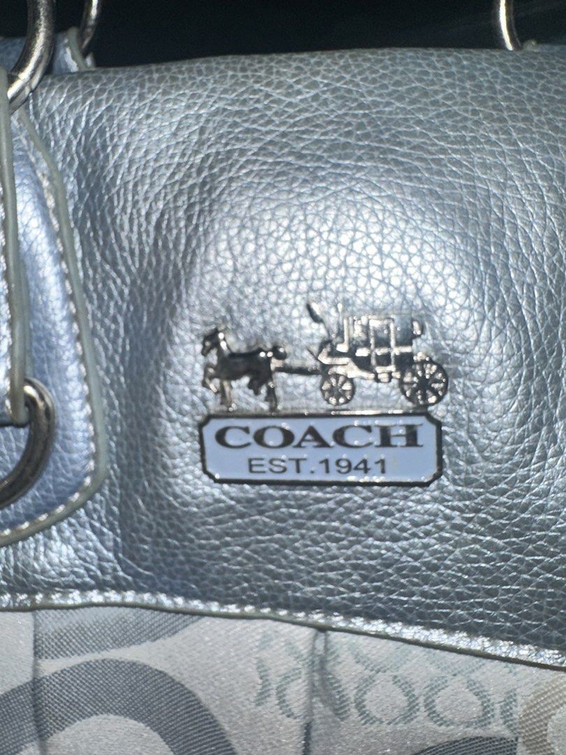 Vintage Coach Signature Patchwork Metallic Blue Handbag (Category: Luxury Bags & Wallets) located in Manila. Submitted by edgiedge (Listing ID 1466505773, Image 2). Description: vintage Coach Ashley satchel featuring the brand's signature monogram sateen fabric accented with metallic silver and light blue leather trim..