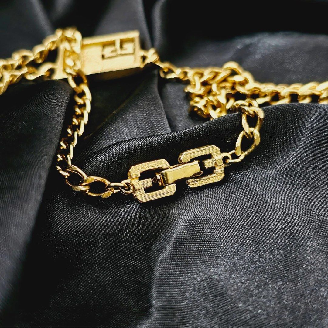 VINTAGE GIVENCHY TAG CHAIN NECKLACE ✨ (Category: Necklaces) located in Mandaluyong City. Submitted by luxprelovedbagsparadise (Listing ID 1466452546, Image 2). Description: ✨ VINTAGE GIVENCHY TAG NECKLACE ✨ Vintage luxury with a modern edge. 🤌🏻✨ This statement Givenchy piece features a sleek rectangular ID plate, signature G logo detail, and a classic curb chain finished with iconic G-logo links on the extension and clasp. 💛 Gold-plated finish