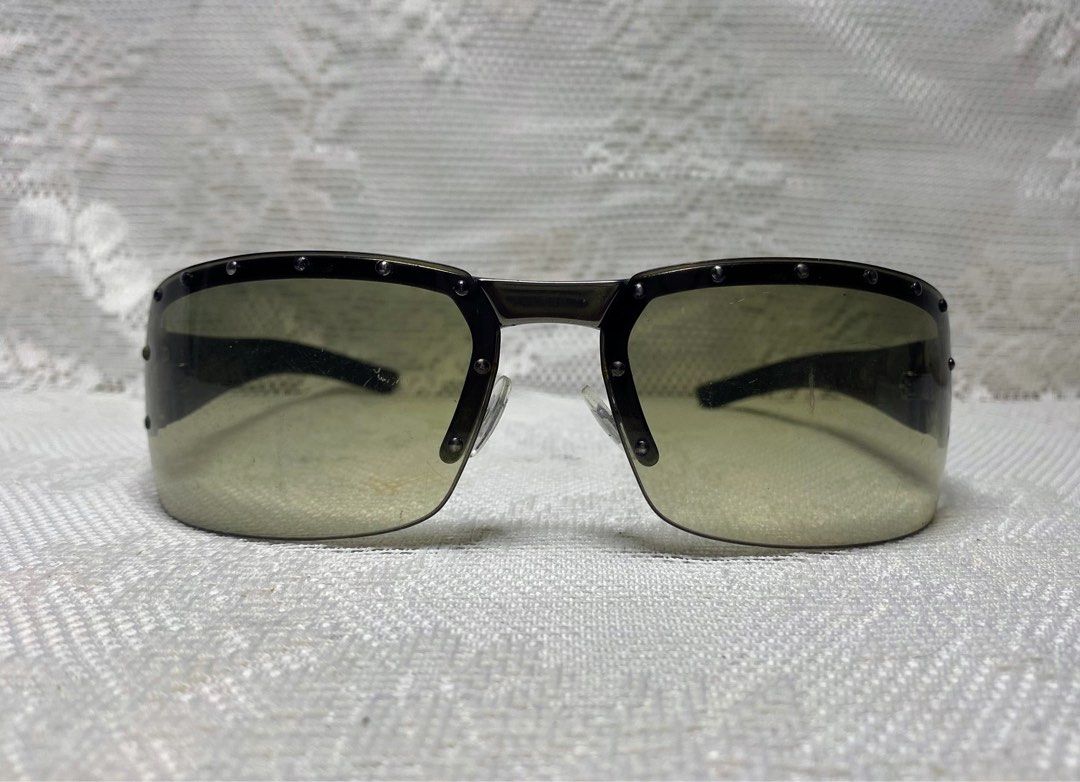 Vintage Gucci sunglasses (Category: Sunglasses & Eyewear) located in Angeles City. Submitted by noagrace (Listing ID 1466348941, Image 1). Description: Gucci GG 1823/S Shield Sunglasses from the early 2000s Tom Ford era. studded hardware details. Normal signs of use 1 missing stud P1300.