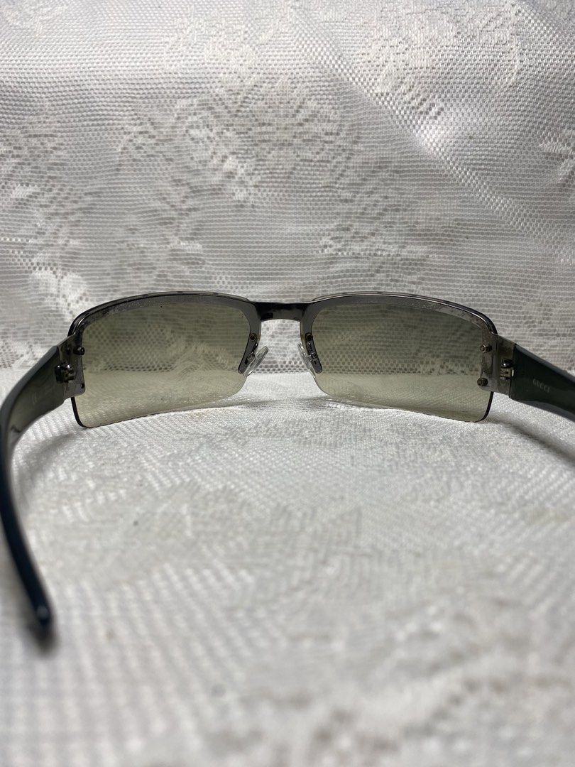 Vintage Gucci sunglasses (Category: Sunglasses & Eyewear) located in Angeles City. Submitted by noagrace (Listing ID 1466348941, Image 3). Description: Gucci GG 1823/S Shield Sunglasses from the early 2000s Tom Ford era. studded hardware details. Normal signs of use 1 missing stud P1300.