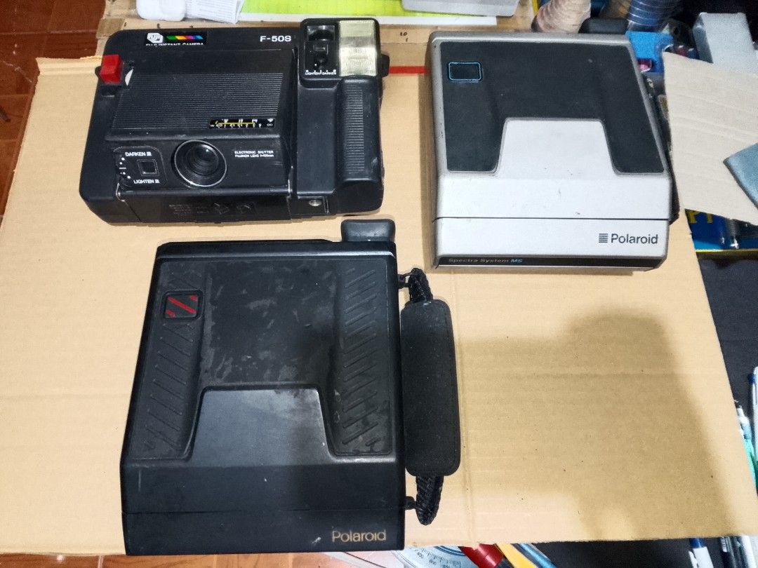 Vintage Insta Cameras Bundle (Category: Cameras) located in Santo Tomas. Submitted by retrotastic (Listing ID 1466371182, Image 1). Description: take all 3 pcs Vintage Instant cameras. untested don't have instant film po pero looks good I think ok pa sya. 3 pcs na po for 800.