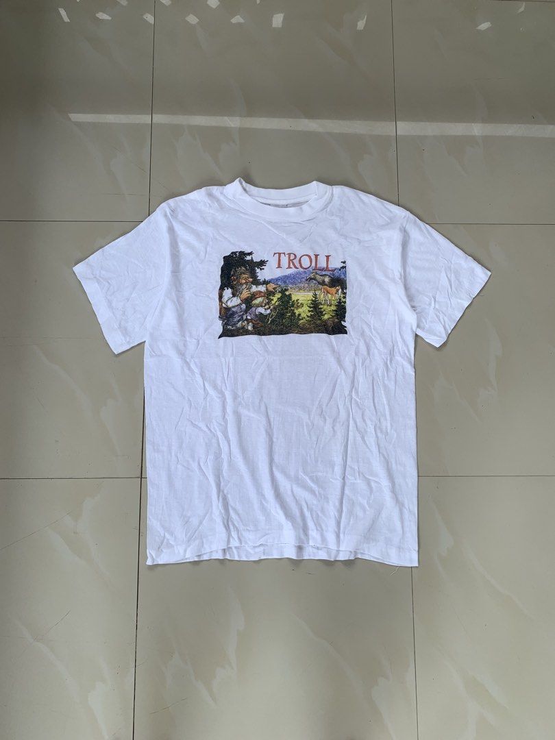 Vintage Norway Trolls Graphic Tee (Category: Tshirts & Polo Shirts ) located in Talaingod. Submitted by anywearthrifted.cs (Listing ID 1466453751, Image 1). Description: (Single stitch all the way) Size small on tag W21.5 x L27.5 Excellent condition Issue: pin hole (not noticeable) Dm 📩.