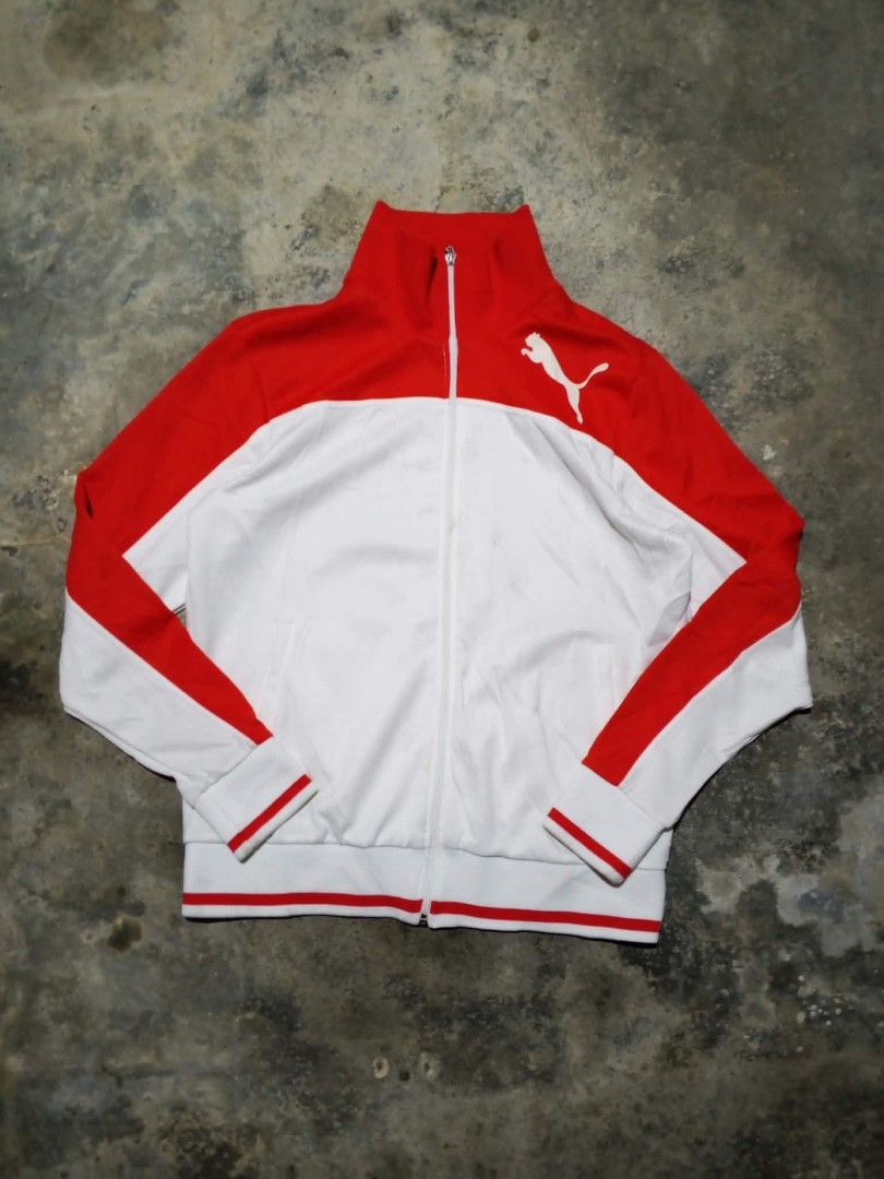 Vintage Puma track jacket (Category: Coats, Jackets and Outerwear) located in General Santos City (Dadiangas). Submitted by thrift_raid (Listing ID 1466342793, Image 2). Description: design stand up collar,full front zipper red and white contrasting panels across the shoulders and sleeves.