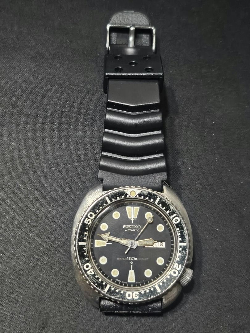 Vintage Seiko JDM "Turtle" Automatic Diver 6306-7001 (Category: Men's Watches) located in Valenzuela. Submitted by habejavier (Listing ID 1466447159, Image 1). Description: - BMBY: Nov 1976 - Dial: All original aged dial with patinated lume hands - Bezel: Rotating original black bezel - Case: Unpolished stainless steel case - Strap: Fitted with a comfortable black ribbed NATO strap - Movement: Automatic 6306-7001 with hacking function, cleaned an