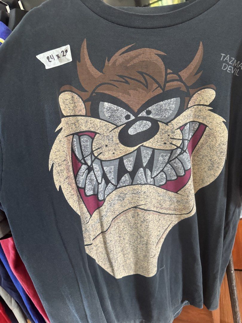 Vintage Taz 1993 (Cut tag “Artex” (Category: Tshirts & Polo Shirts ) located in Laoag. Submitted by quin.r (Listing ID 1466408896, Image 2). Description: Vintage Taz dated 1993 Artex tag (cut tag) 24x28 Single stitch all over (1-1-1) Slight distressed neckline Armpit hole Excellent Vintage Fade Shipped price Slightly nego.