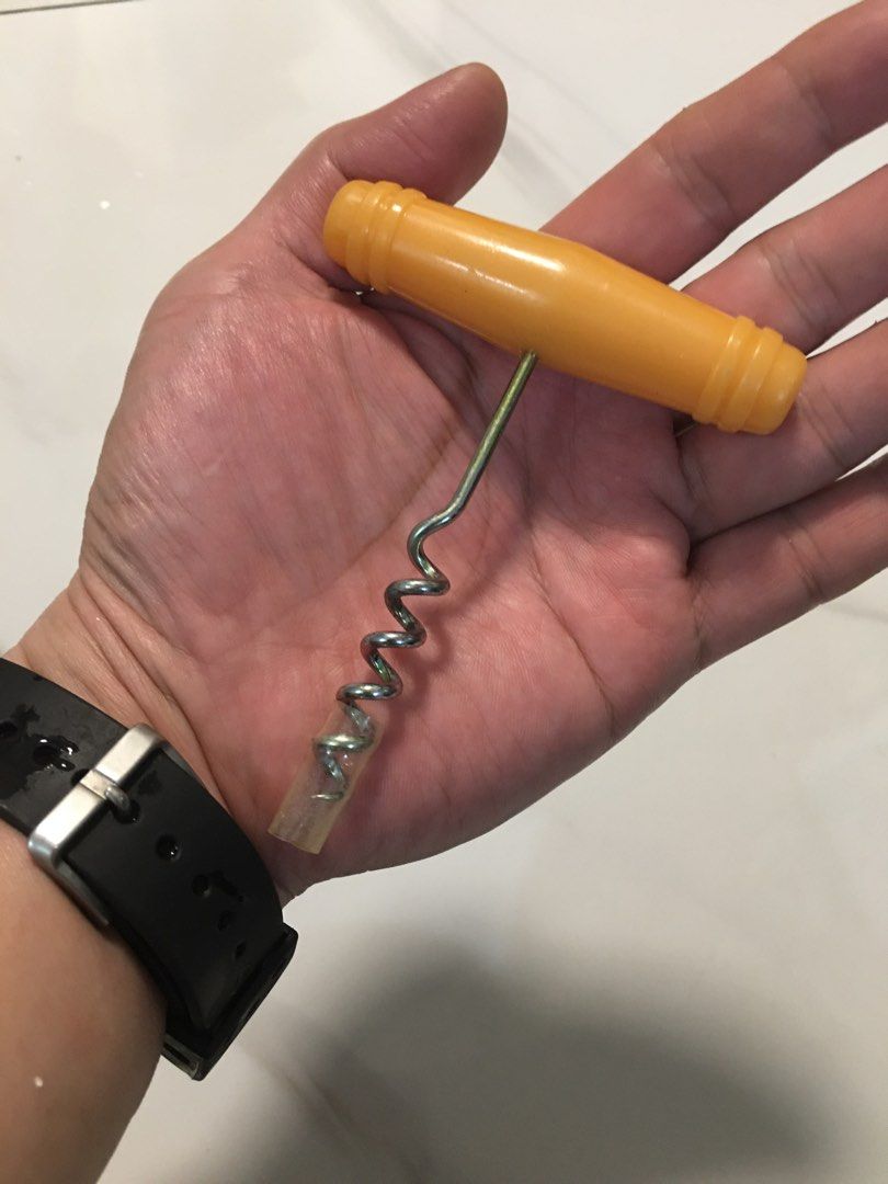 Vintage yellow handle corkscrew bottle opener wine tool (Category: Vintage Collectibles) located in Pasay City. Submitted by gilbertso62551 (Listing ID 1466472125, Image 2). Description: - Bright yellow plastic handle with ribbed details for a solid, comfortable grip - Durable metal screw equipped with a clear protective cap on the tip - Simple manual design for quick and effortless wine bottle opening - Clean condition and ready for immediate us