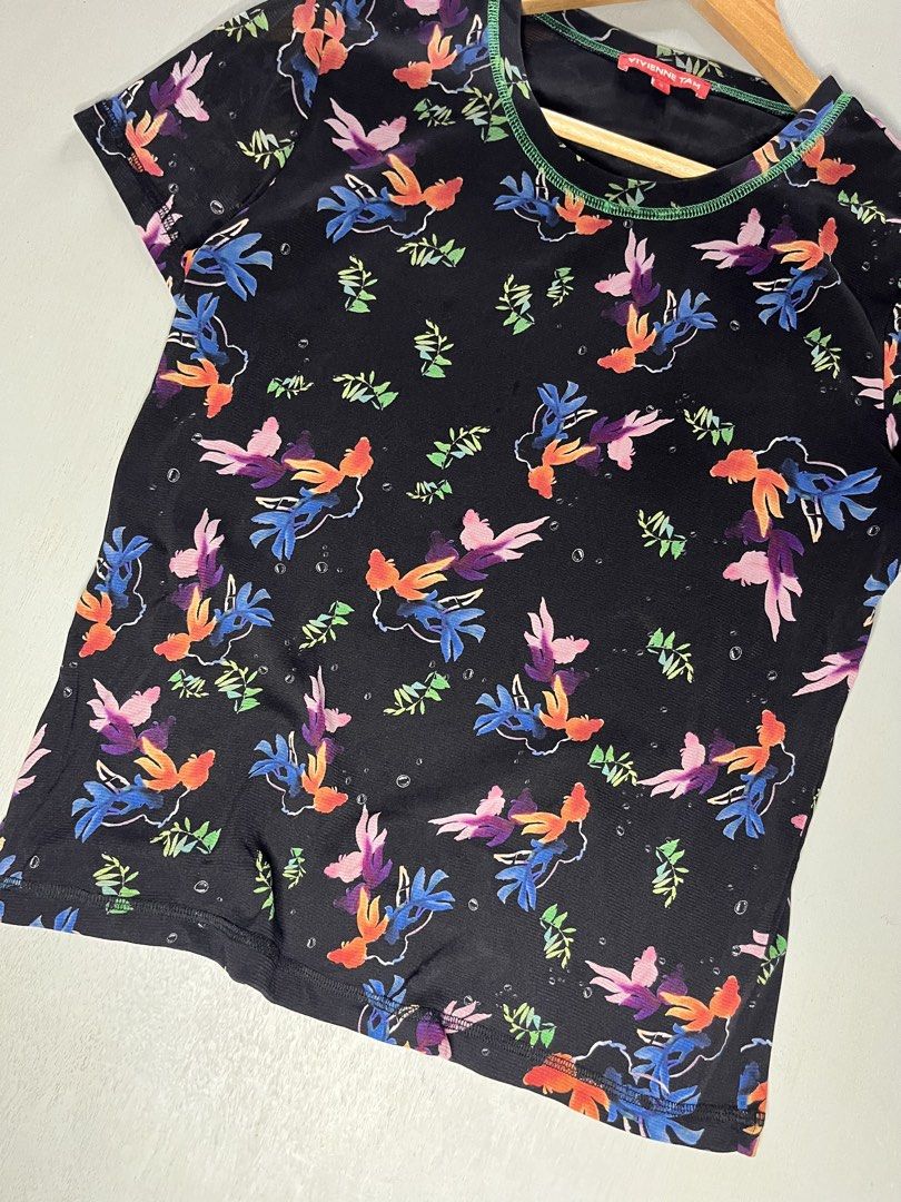 Vivienne Tam (Category: Others Tops) located in Catbalogan. Submitted by wayndsyclee. (Listing ID 1466422803, Image 3). Description: Vivienne tam No issue Excellent Color ratw 9.5/10 Size xs or small Dimes:w17/L21.