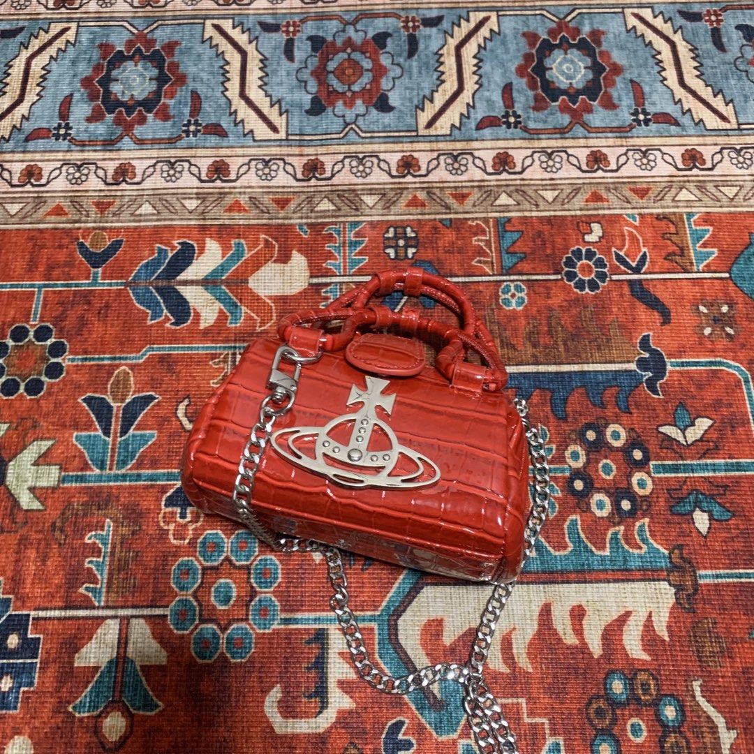 Vivienne westwood bundle (Category: Shoulder Bags) located in Quezon City. Submitted by hatlocker (Listing ID 1466435740, Image 3). Description: dm if interested .
